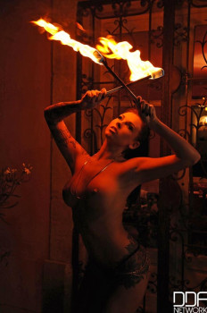 flaming-hot-pussy-sexy-pyromaniac-plays-with-fire-0.jpg